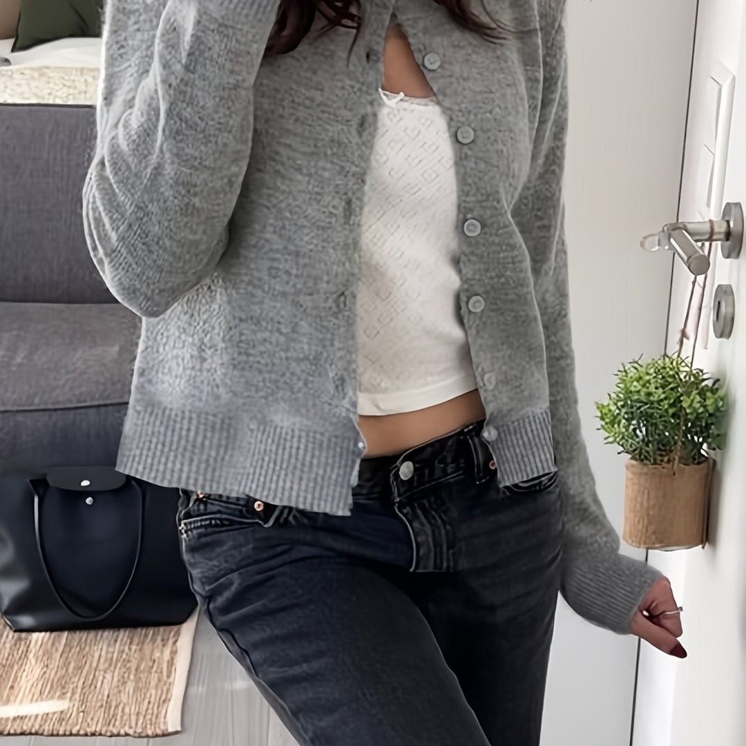 Stylish women's cropped knit cardigan; cozy alpaca blend sweater with full-length sleeves and front buttons