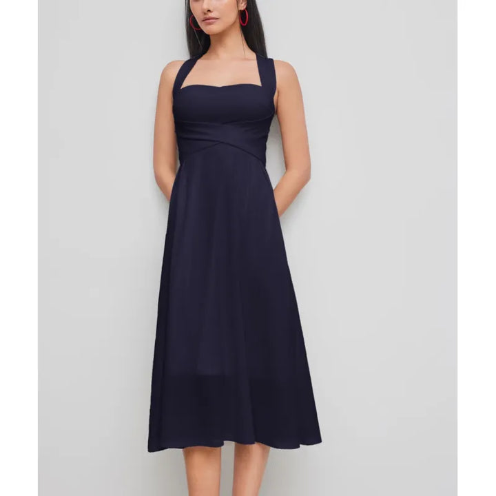 Flattering women's midi dress with an elegant cross-waist and square neckline. Chic sleeveless A-line design for summer comfort.