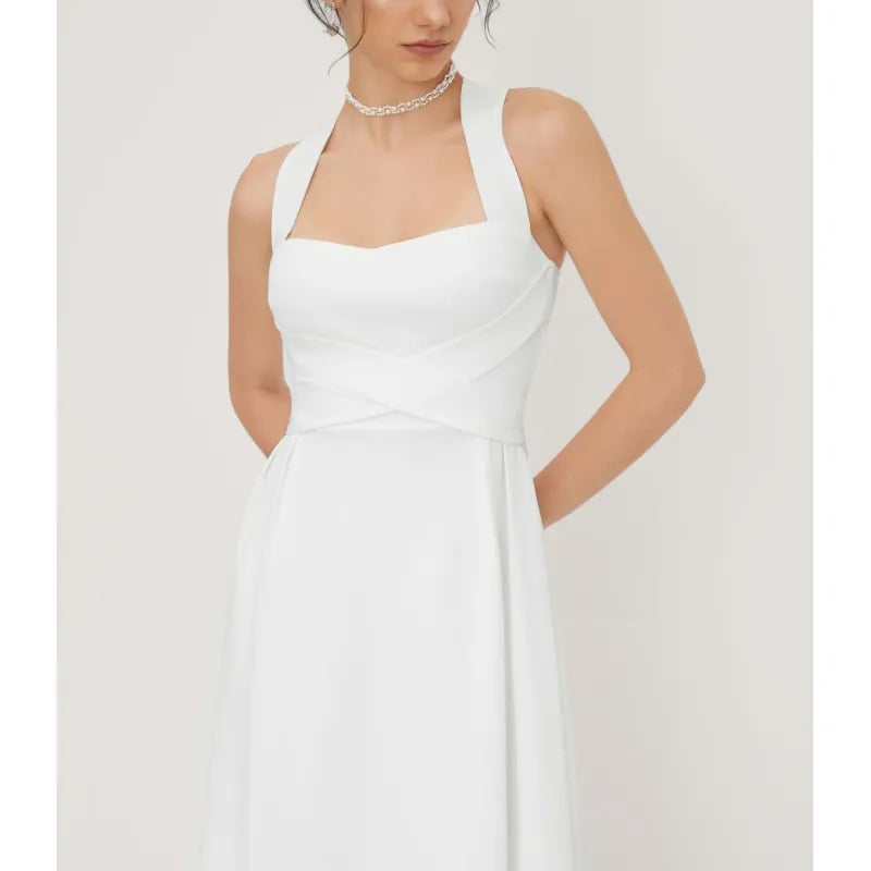 Women's elegant A-line midi dress, featuring a chic cross-waist and stylish square neckline. Perfect versatile summer occasion wear.