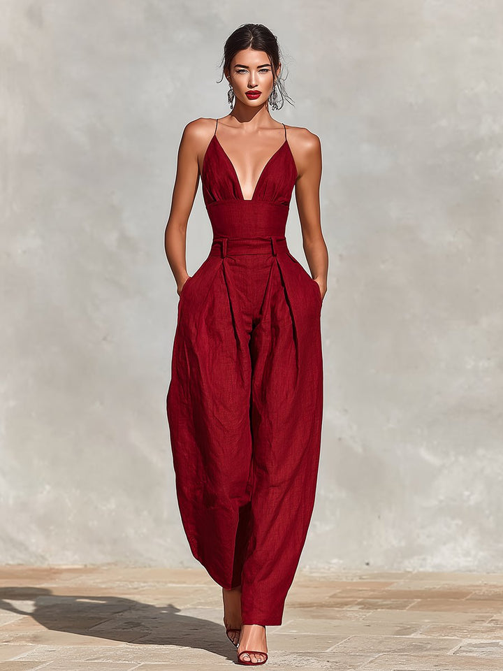Chic red women's formal deep V-neck wide leg jumpsuit, ideal for parties & resort wear.