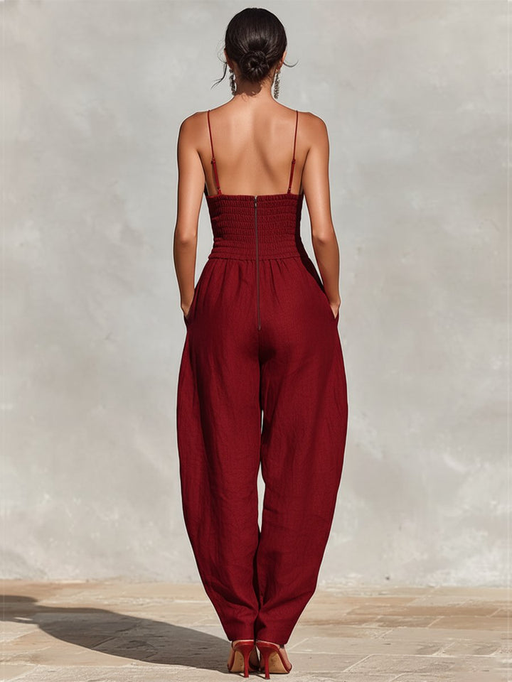 Stylish black women's deep V-neck wide leg formal jumpsuit, perfect for evening and party outfits.