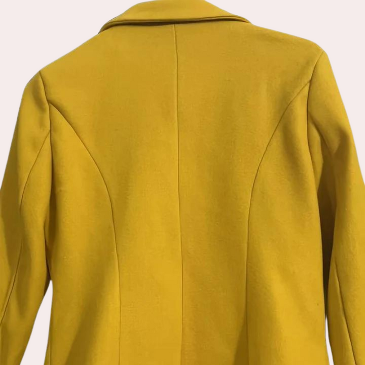 Stylish double-breasted women's trench coat featuring a cinched waist, great for elegant winter & fall fashion.
