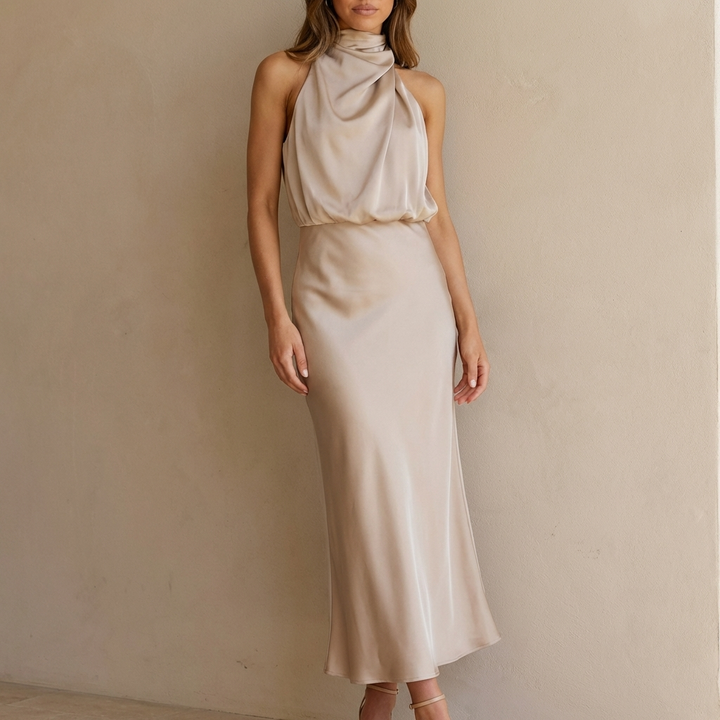 Elegant women's draped halter midi dress with a blouson waist, perfect for special occasions.