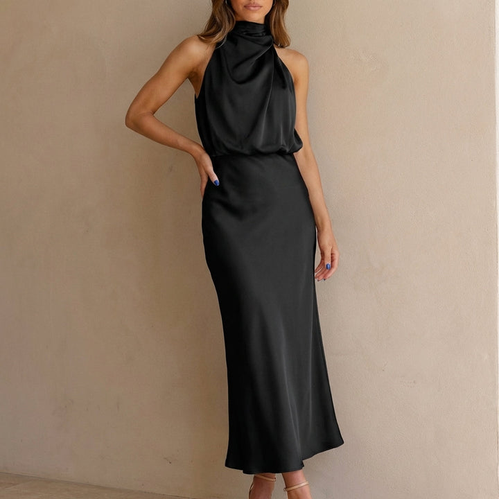 Sophisticated women's midi formal dress featuring a chic halter neck and elegant blouson waist.