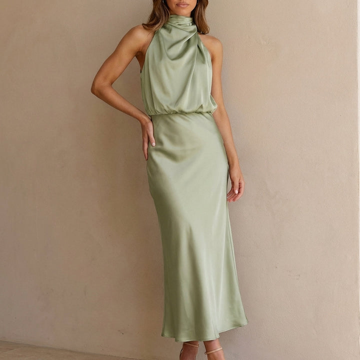 Women's elegant evening dress: a draped halter midi with a blouson waist for a sophisticated look.
