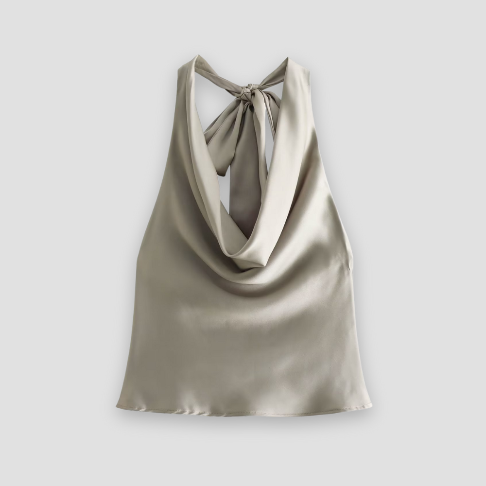 Chic sleeveless halter top for women, featuring a fashionable draped design. Versatile for dressy occasions.