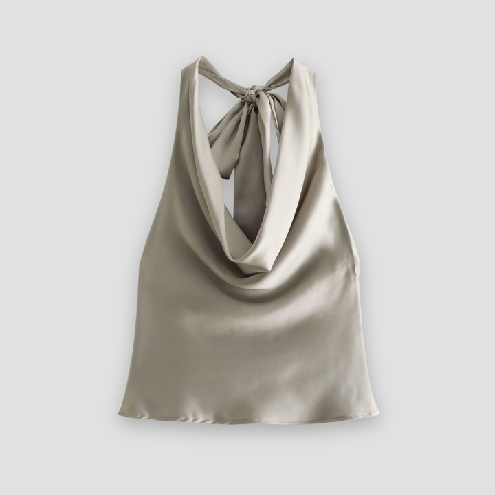 Chic sleeveless halter top for women, featuring a fashionable draped design. Versatile for dressy occasions.