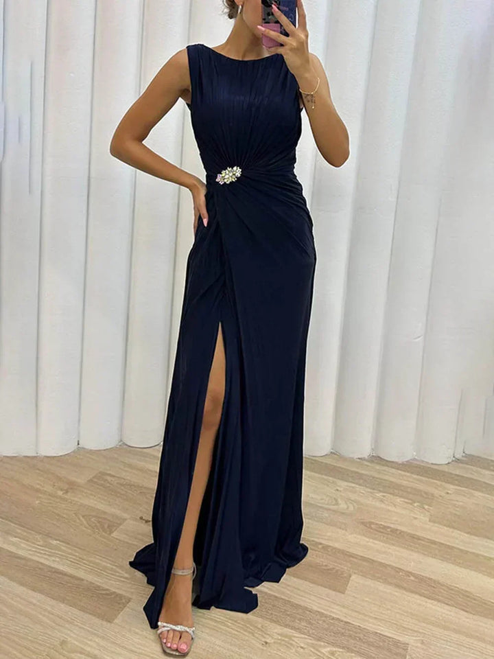 Sophisticated draped maxi dress for women, ideal as a wedding guest outfit or formal evening gown.