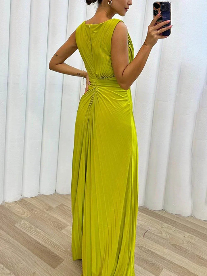 Statement women's formal maxi gown, elegantly draped for wedding guests and sophisticated evening wear.
