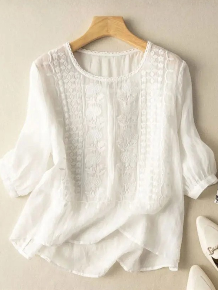 Elegant women's embroidered blouse, relaxed fit, long sleeve. Perfect for versatile spring & summer casual chic style.