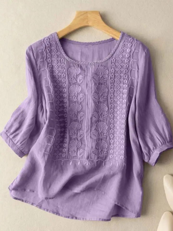 Fashionable women's embroidered long sleeve top. Relaxed fit for elegant casual chic spring & summer wear.