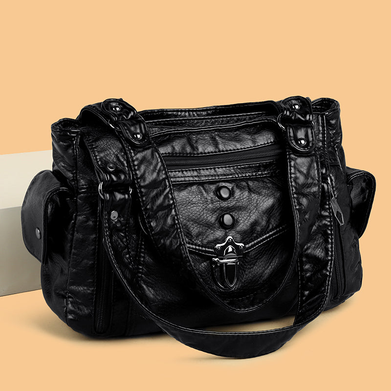 Classic tote bag for women, made from high-quality faux leather, a versatile accessory.