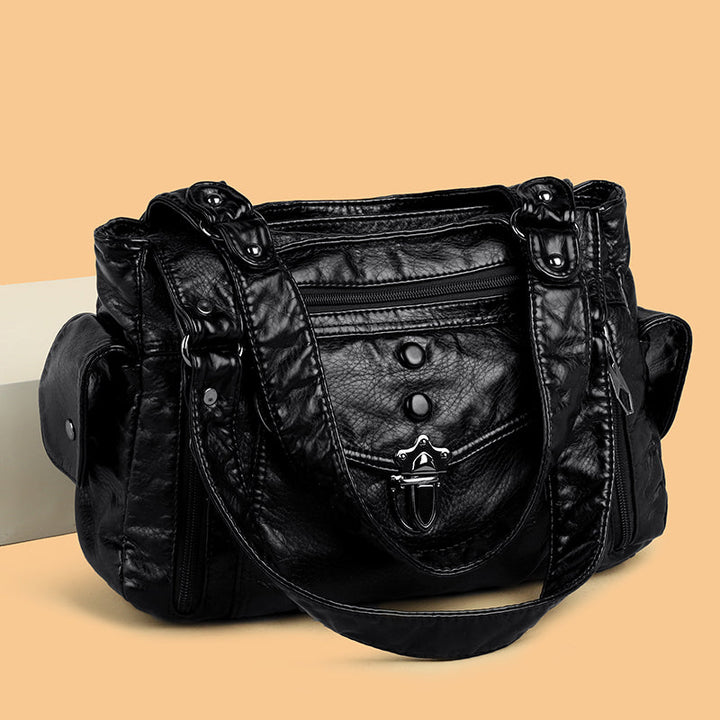 Classic tote bag for women, made from high-quality faux leather, a versatile accessory.