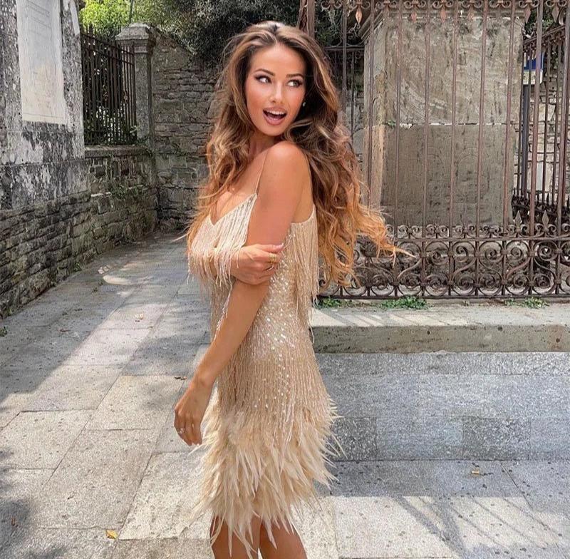 Glamorous feather fringe evening gown for women, sophisticated special occasion formal wear.