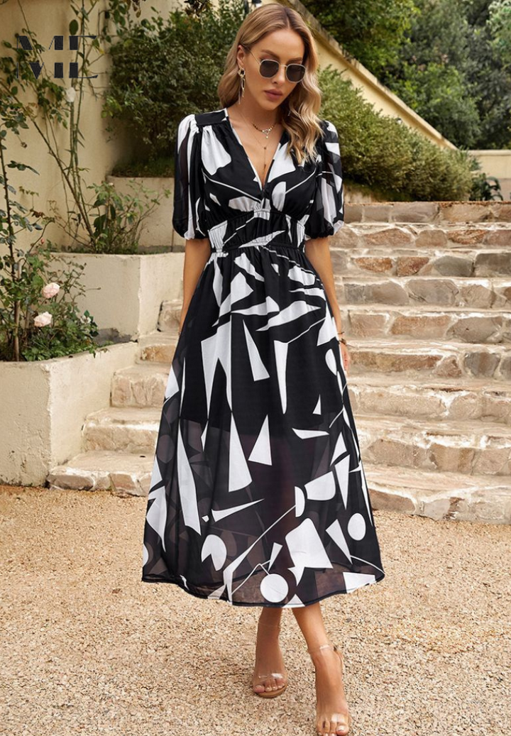 Stylish women's floral A-line midi dress with short sleeves, ideal for elegant and casual summer events.