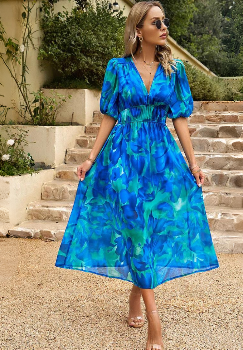 Chic women's floral print A-line midi dress, short sleeves, comfortable summer wear.