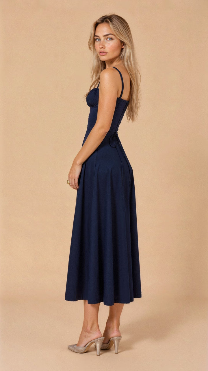 Women's elegant summer floral midi dress, flattering corset style, and a graceful leg slit.