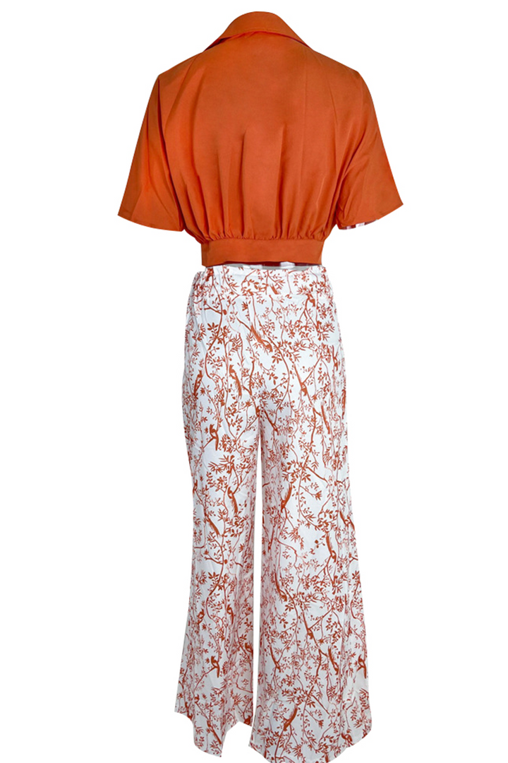Blue women's elegant floral crop top and flowy maxi skirt set. Ideal summer fashion for women.
