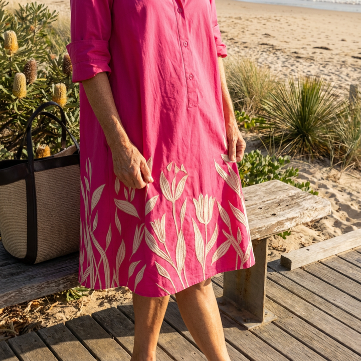 Versatile women's embroidered floral midi shirt dress, perfect for sophisticated casual or elegant occasions.