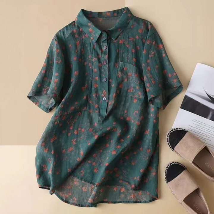 Elegant women's floral half-placket button shirt, perfect for casual wear or dressing up. A versatile summer top.