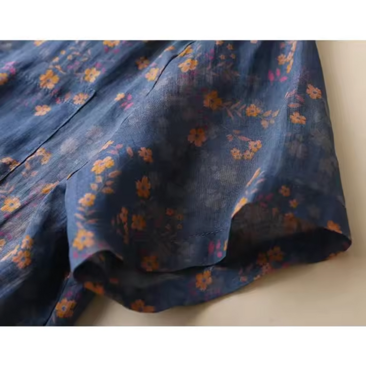 Women's versatile floral half-placket button shirt, a lightweight summer top. Great for an elegant look or casual printed blouse.