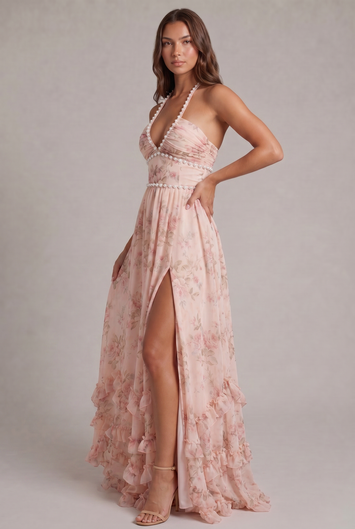 Halter neck floral maxi dress for women, featuring a flowing pleated design, perfect for elegant evening wear.