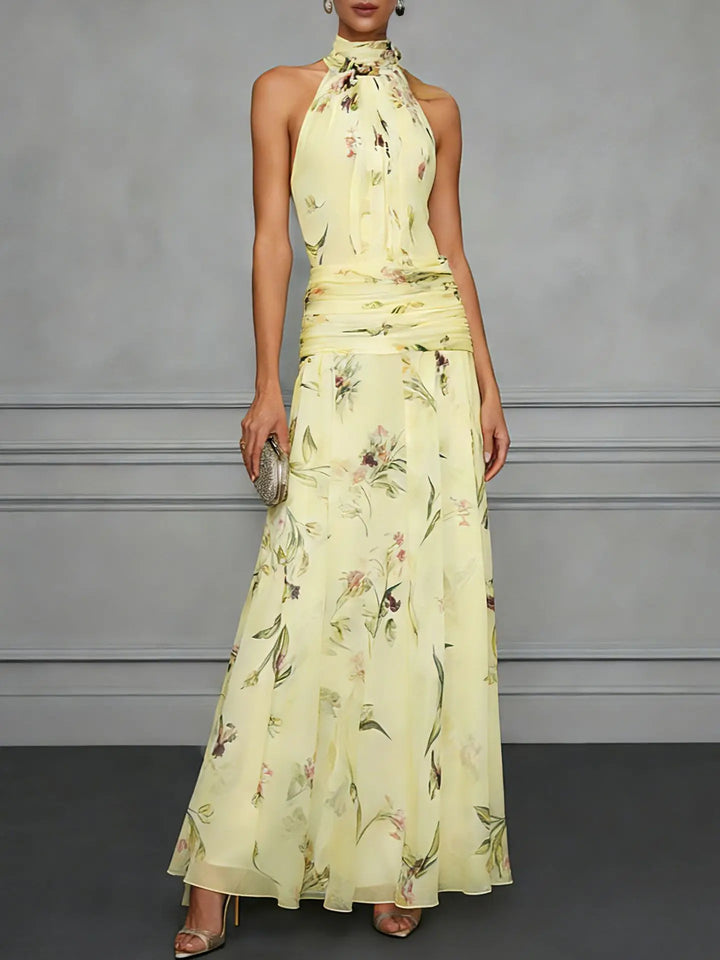 Stylish A-line floral print maxi dress with halter neckline for women, ideal for summer fashion & events.