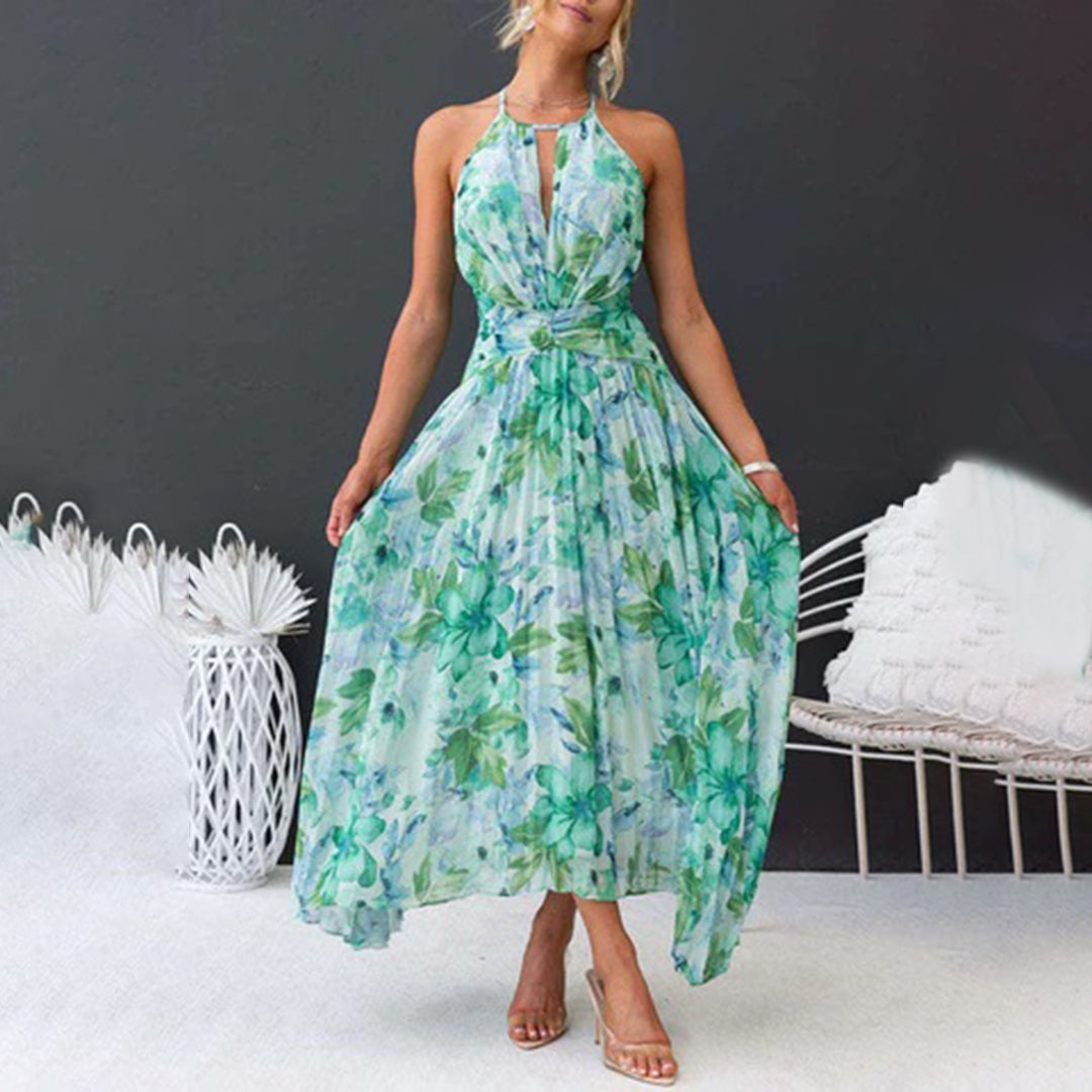 Light & airy floral maxi dress for women, featuring a comfortable halter neck & twist waist, great for special occasions.