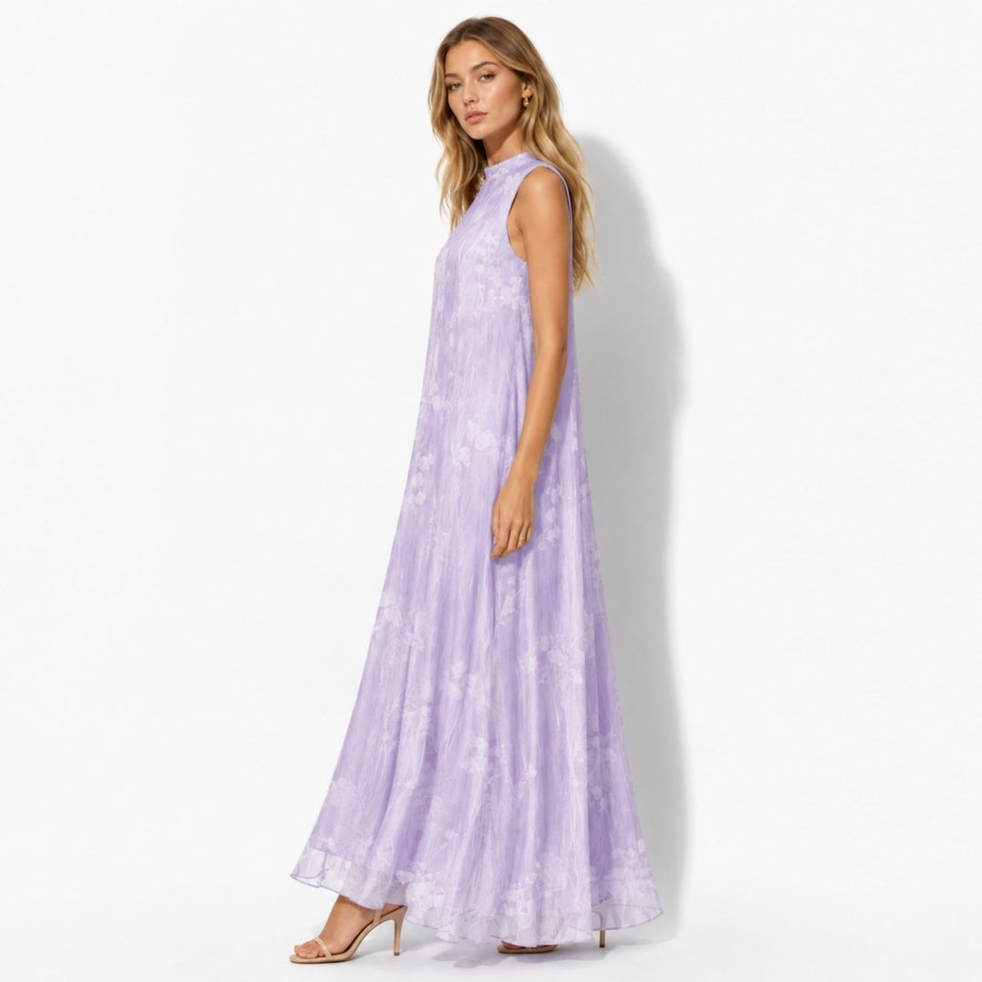 Close-up of the vibrant floral print and high neck design on a women's maxi dress, ideal for wedding guests.