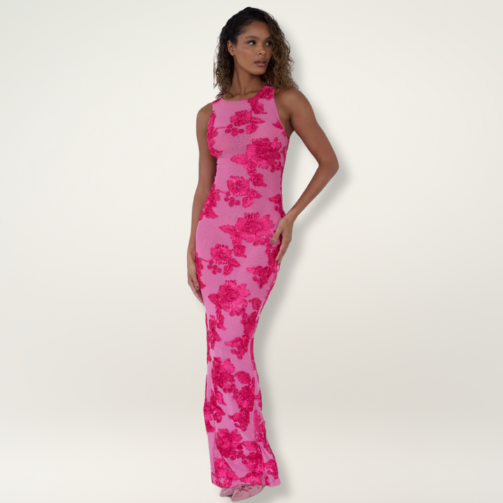 Sleeveless column maxi dress with delicate floral print & chic high neck. Ideal for a wedding guest.
