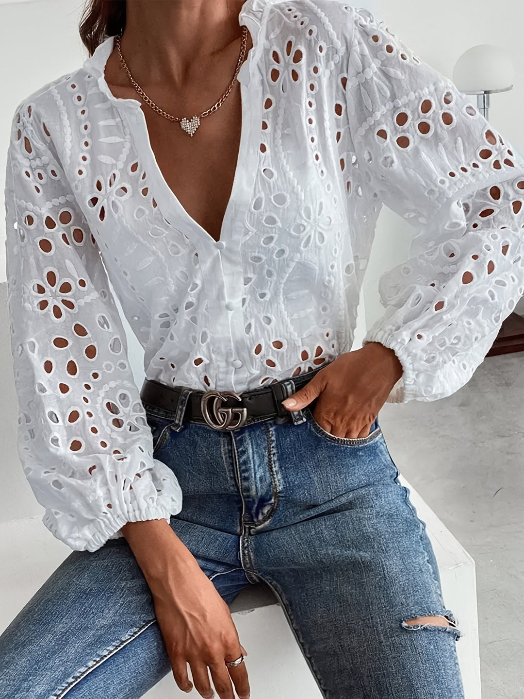 Elegant women's floral long-sleeve blouse with button front, perfect for office or chic casual spring fashion.