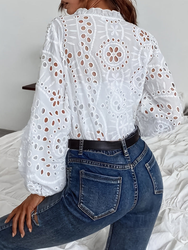 Stylish women's floral print long-sleeve button-front blouse. Elegant top for spring/fall, office, or casual wear.