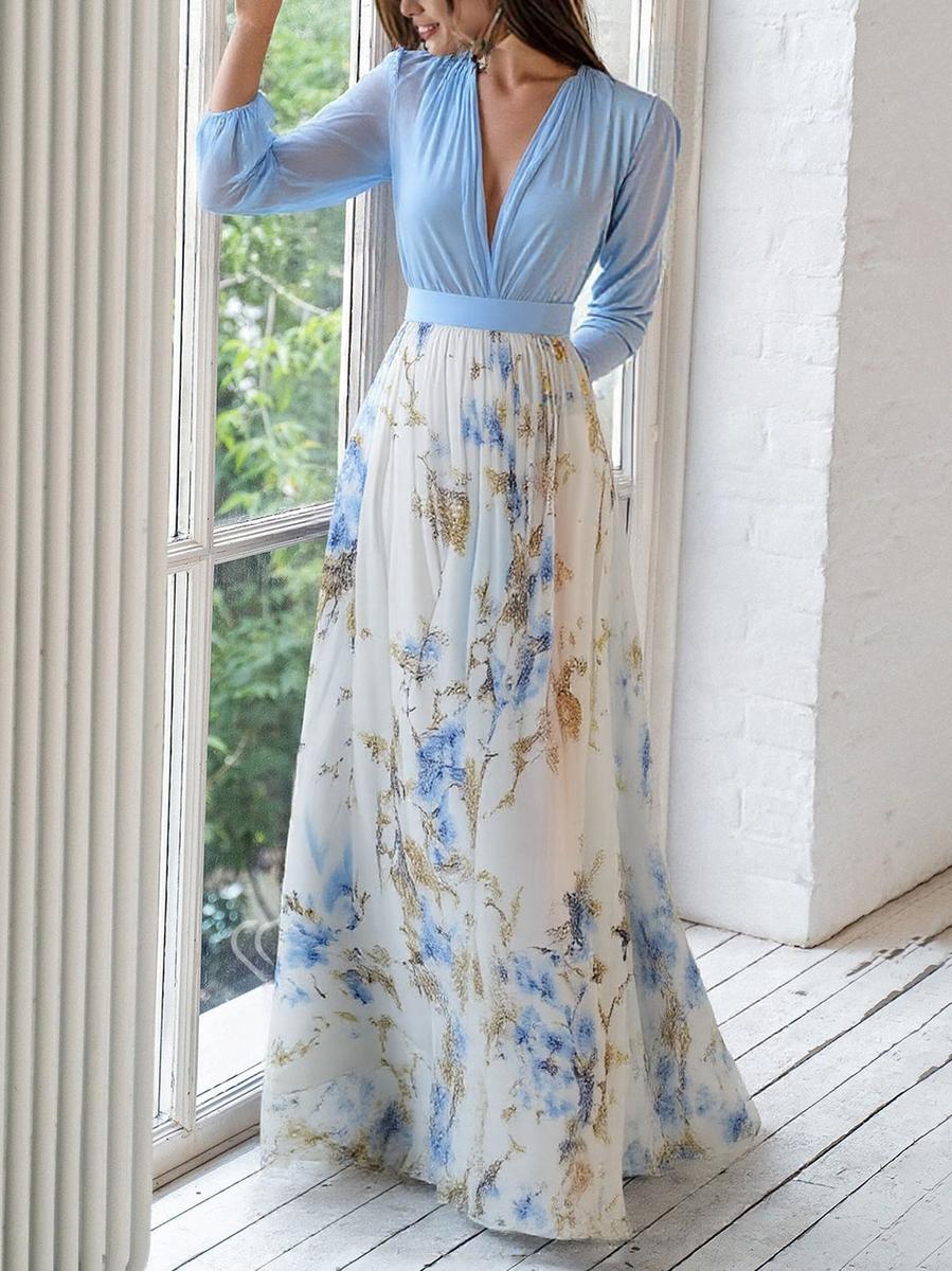 Comfortable women's flowing maxi dress featuring a beautiful floral print and elegant V-neck design for summer.