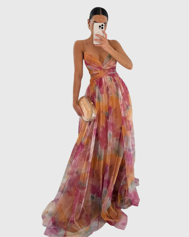 Elegant women's floral maxi dress with crisscross straps, perfect for summer vacation & beach.
