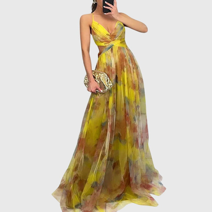 Vibrant floral patterned women's summer maxi dress, elegant flowy design for vacation.