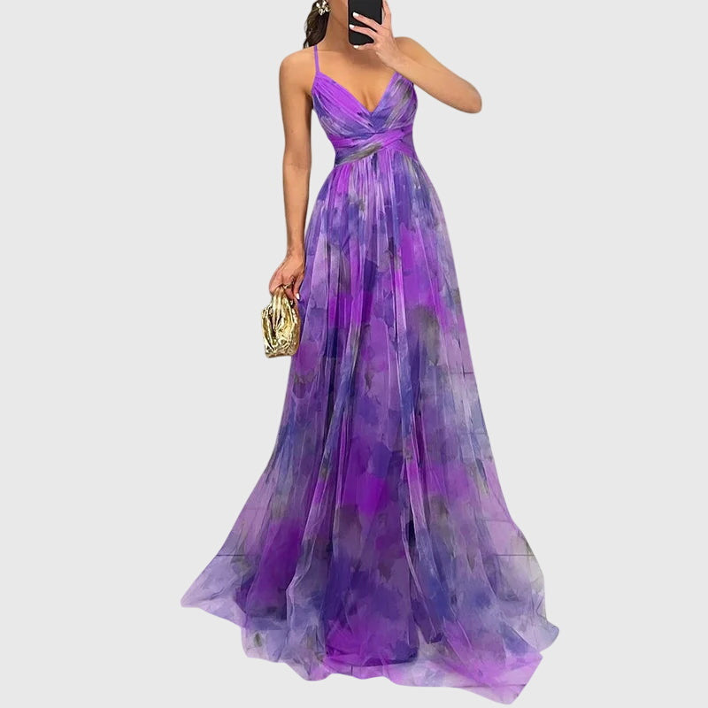 Beautiful women's floral maxi dress with crisscross straps, elegant and flowy for summer.
