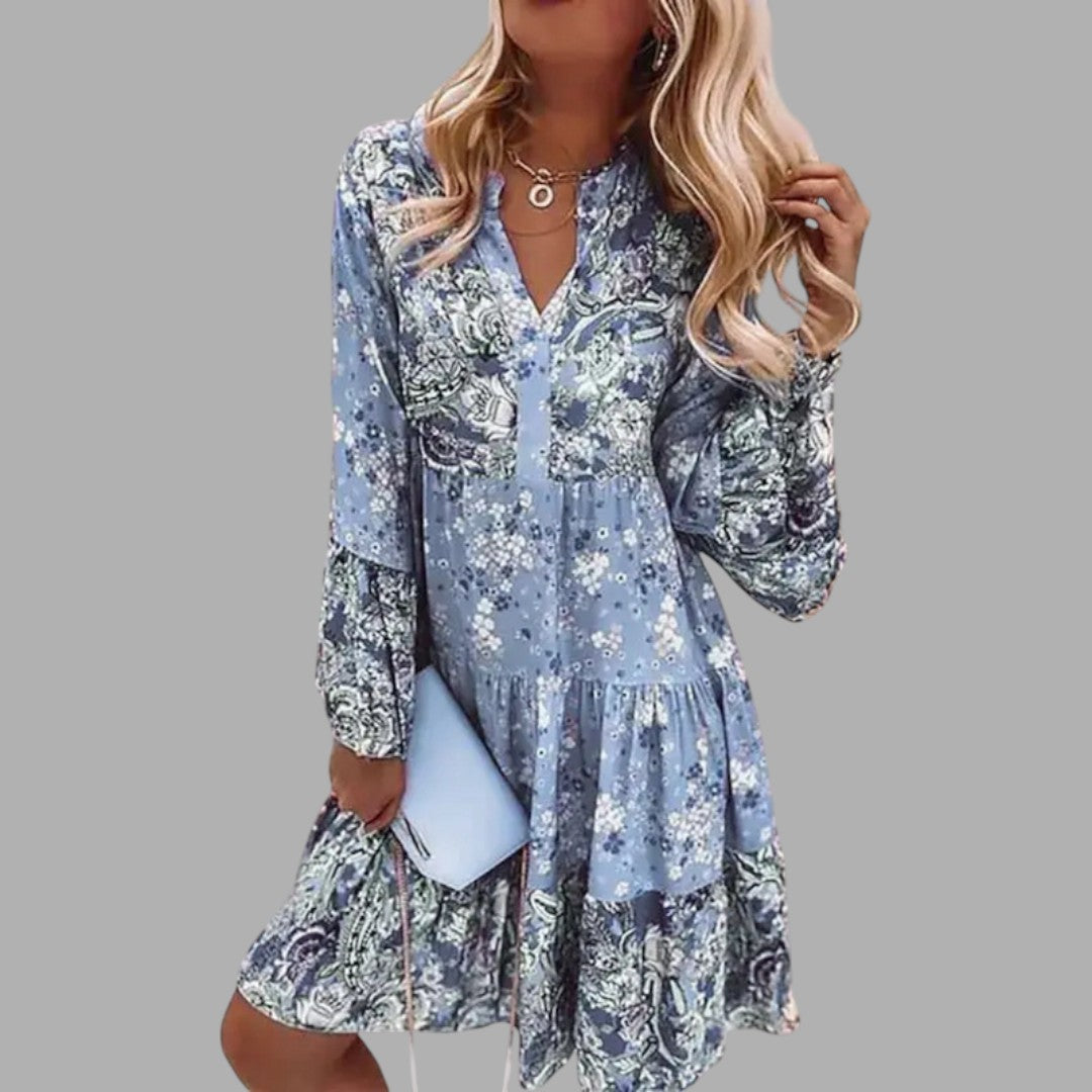 Charming women's floral printed midi dress, perfect for spring fashion or elegant summer style.