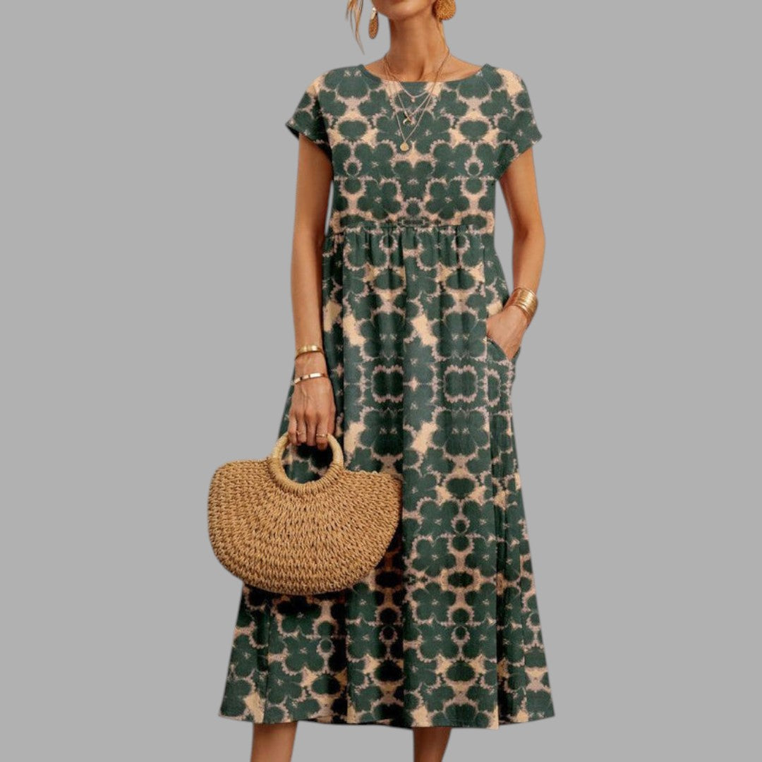 Women's elegant floral print midi dress, ideal occasion wear. Semi-formal spring/summer style for graceful events.