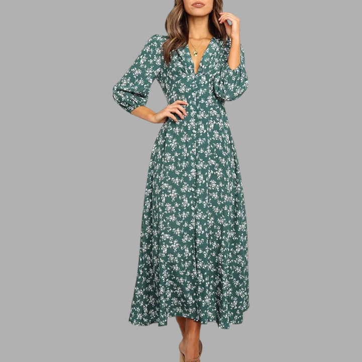 Graceful women's floral midi dress, ideal for spring/summer parties, offering elegant style and comfort.