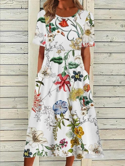 Graceful women's floral midi dress, ideal for spring or summer vacation. Features short sleeves & a comfortable, flattering fit.