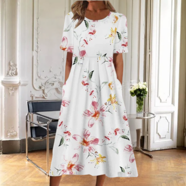 Stylish women's short sleeve floral midi dress. Perfect versatile day dress for elegant spring & summer casual.