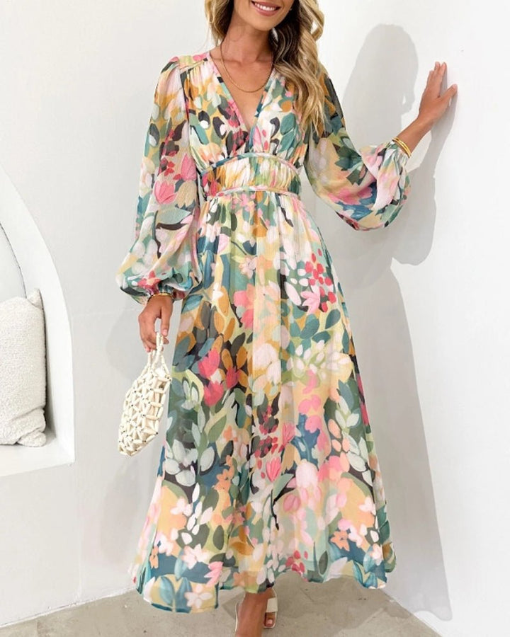 Chic women's floral print midi dress, V-neck, long sleeves & belt. Ideal for brunch & special occasions.