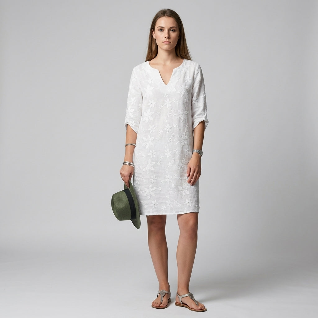 Elegant women's floral midi dress with V-neckline & half sleeves. Perfect for spring & summer occasions.