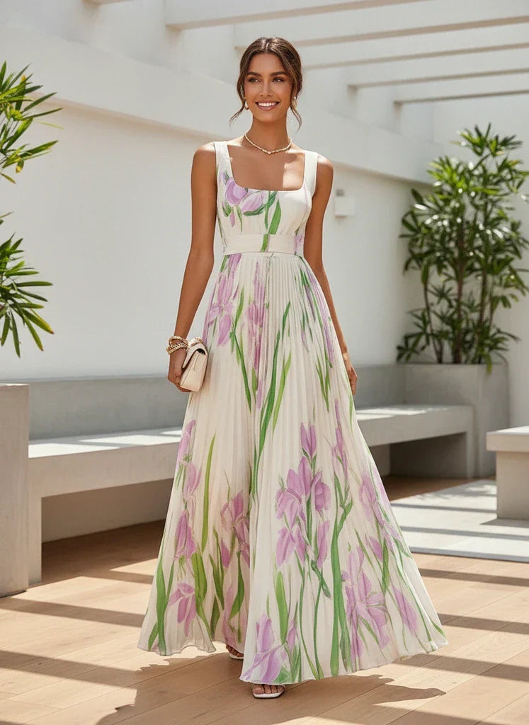 Beautiful women's floral print pleated maxi dress, excellent as an elegant wedding guest gown.