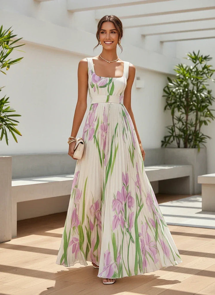 Beautiful women's floral print pleated maxi dress, excellent as an elegant wedding guest gown.