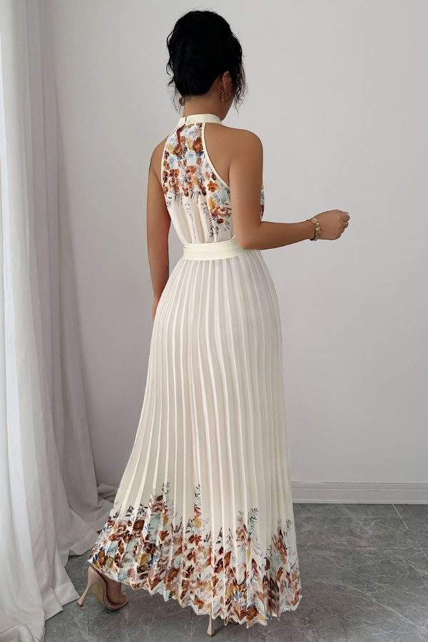 Women's square neck floral midi dress, perfect for spring, featuring a beautiful pleated skirt and flowy fabric.