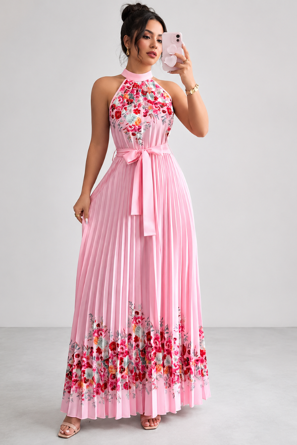 Flowy women's midi dress featuring a beautiful floral print, delicate pleats, and a square neckline.