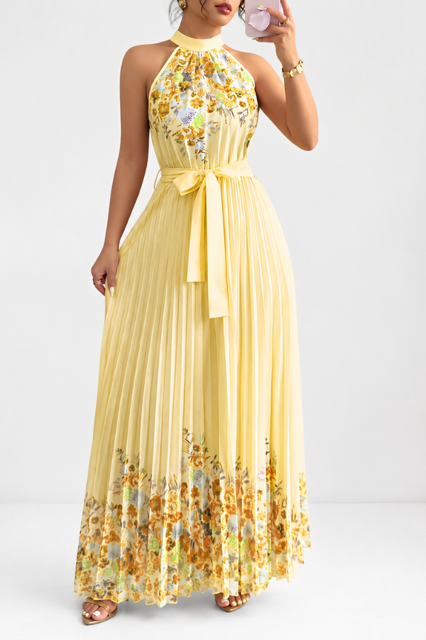 Women's flowy floral midi dress, designed with a square neck and an elegant pleated skirt for warm days.