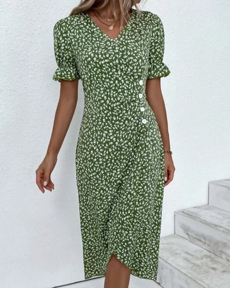 Flattering V-neckline detail on a comfortable women's floral print flowy summer midi dress. Elegant.