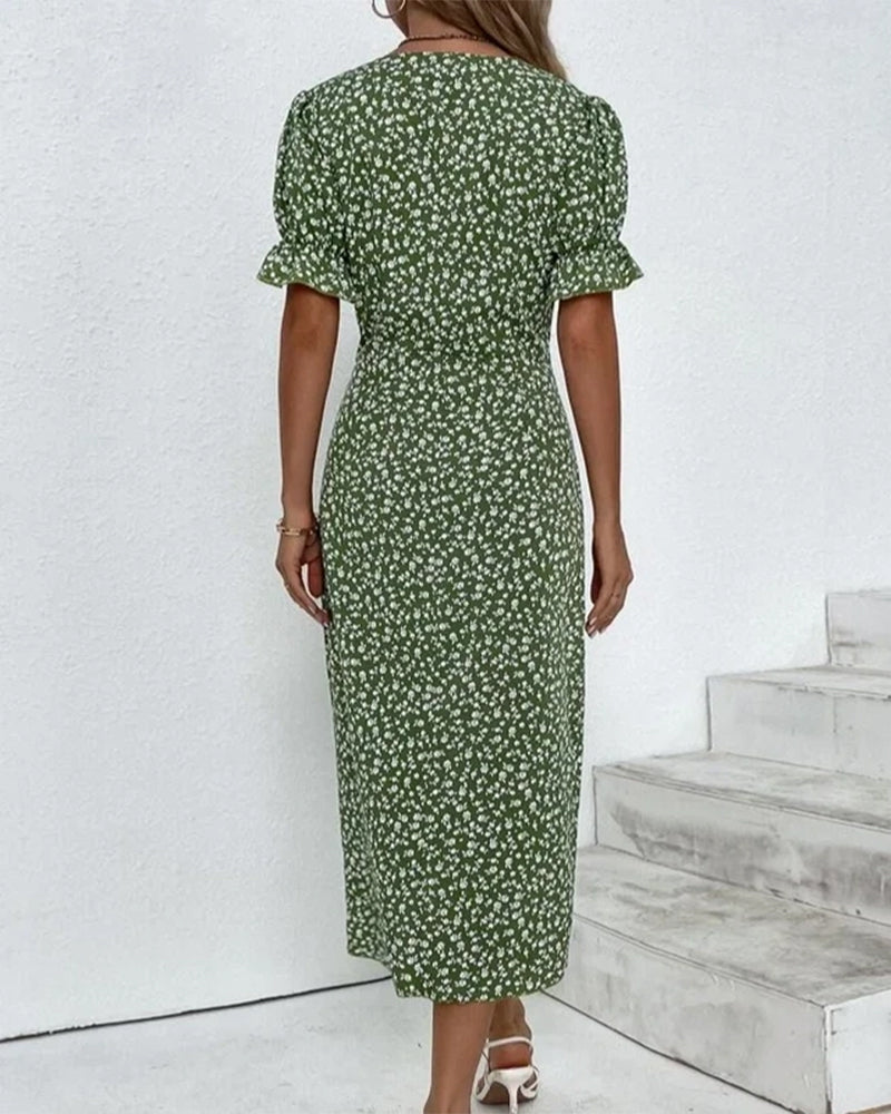 Woman in a casual floral V-neck flowy midi dress, enjoying comfortable and elegant summer day fashion.